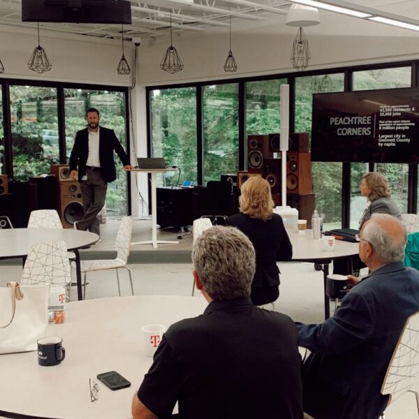 A man giving a presentation in the Innovation Center event space